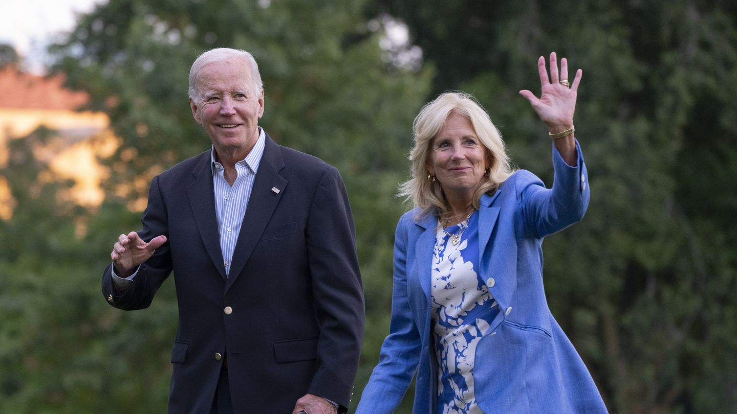 President Biden and first lady Jill Biden waved as they arrived at the White House on Aug. 26.