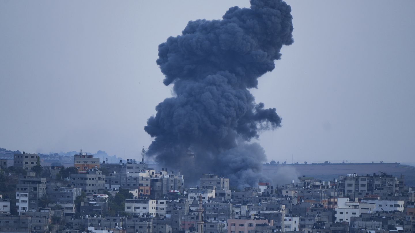 Smoke rose following an Israeli airstrike, in Gaza City on Sunday. The militant Hamas rulers of the Gaza Strip carried out an unprecedented, multi-front attack on Israel at daybreak Saturday, firing thousands of rockets as dozens of Hamas fighters infiltrated the heavily fortified border in several locations, killing hundreds and taking captives. Palestinian health officials reported scores of deaths from Israeli airstrikes in Gaza.